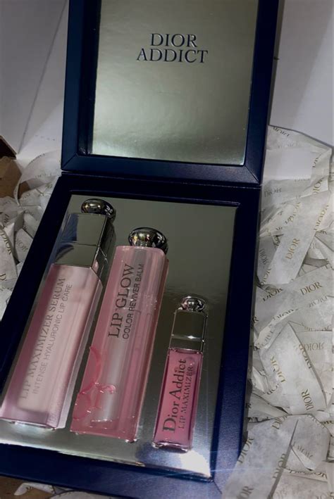 Dior Addict Makeup Gift Set: 1 Lip Balm and 2 Glosses.